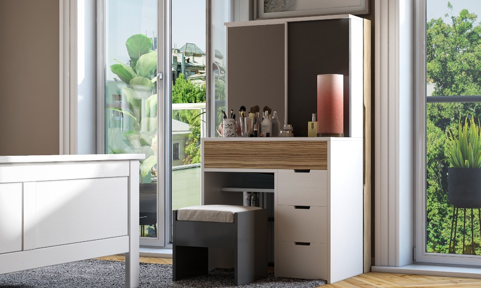 Bedroom interior design with dressing table along with dresser unit drawers