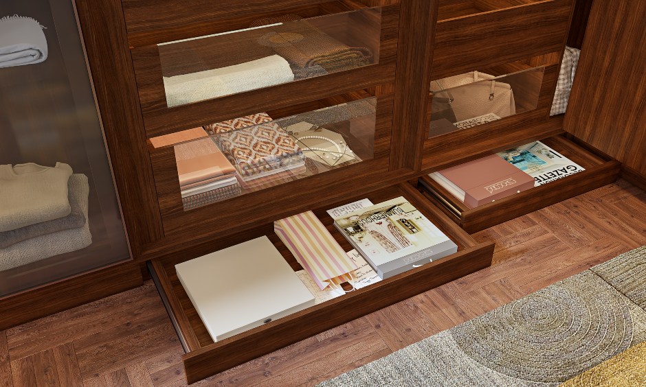 A walk-in wardrobe design with a dressing unit and skirting drawers that blend into the wardrobe