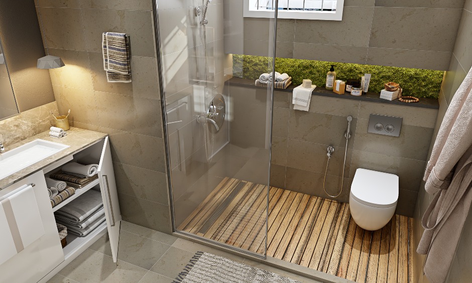 New bathroom design with glass partition shower cubicle and warm wooden flooring.