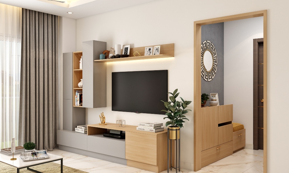 Compact living room in neutrl tone featuring l-shaped tv unit