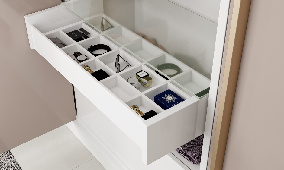 Floor to ceiling wardrobe with built in accessory tray with multiple compartments