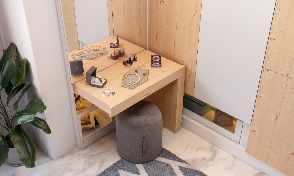 L shaped wardrobe design with pull-out dresser unit with storage space