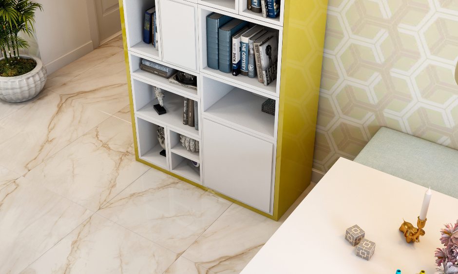 Dining cum living area with a vertical bookshelf with open and closed cabinets