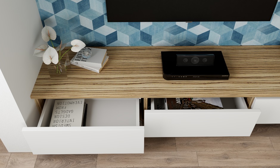 Tv unit with push to open drawers for storage in small living room design