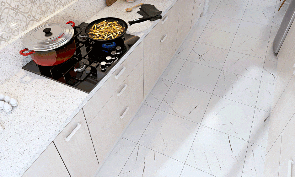 Parallel shaped modular kitchen design in blue with drawer under stove with cutlery organiser