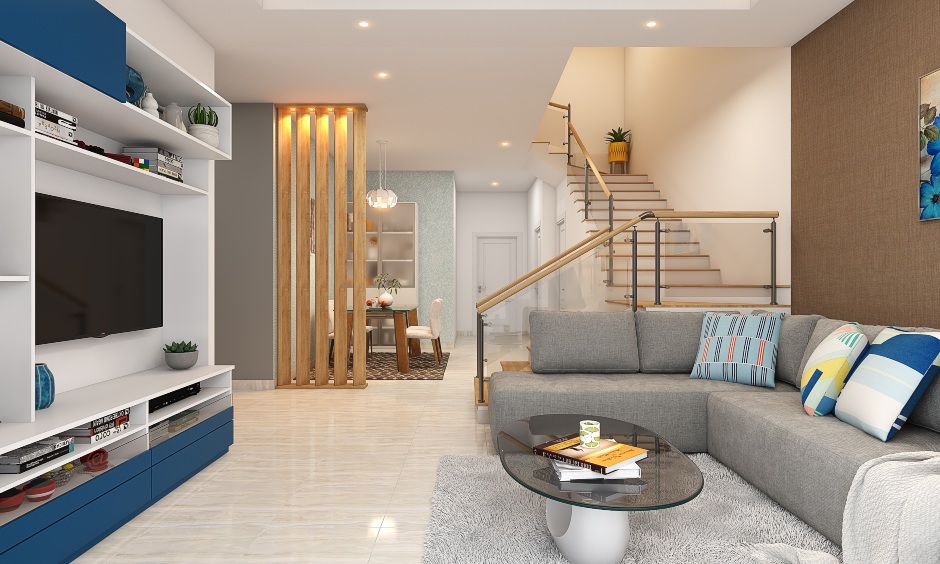 A Classy Living Room With A Modular TV Unit In Blue And White - DesignCafe