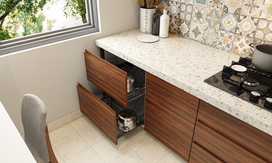 Kitchen with wall mounted foldable dining table with drawers and moroccan style backsplash