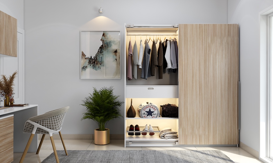 Sliding door wardrobe design for bedroom India with multiple components saves a lot of space