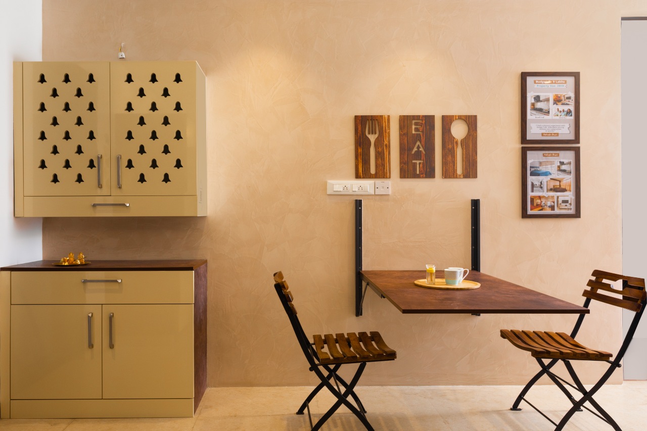 Wall-mounted foldable dining table in thane experience centre