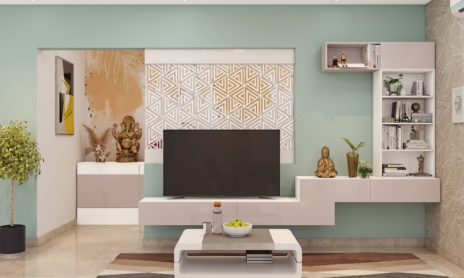 A modern living room is designed with a jaali partition behind the tv unit