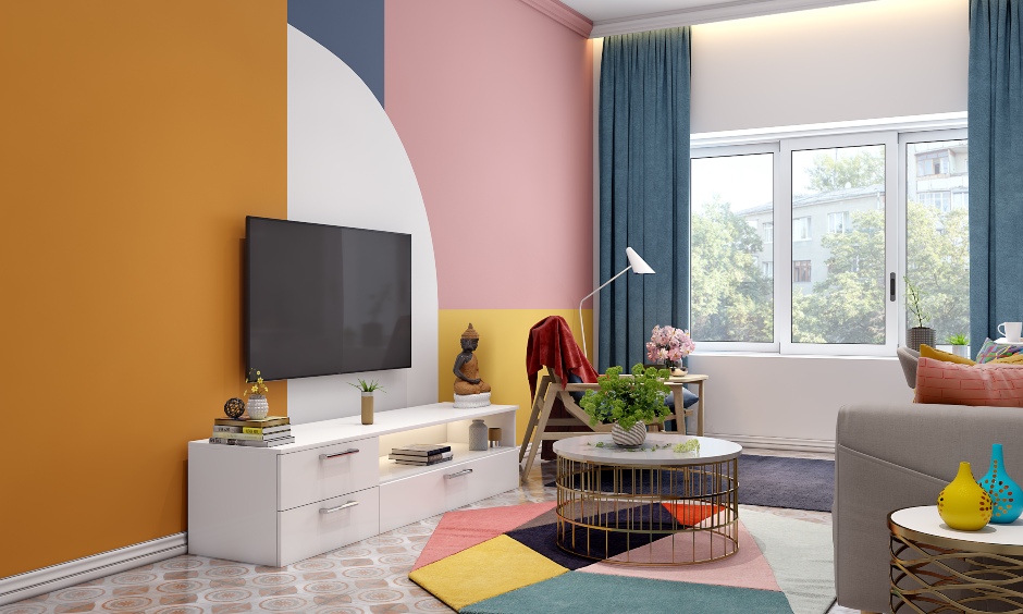 Open living room designed with small tv unit and coffee table
