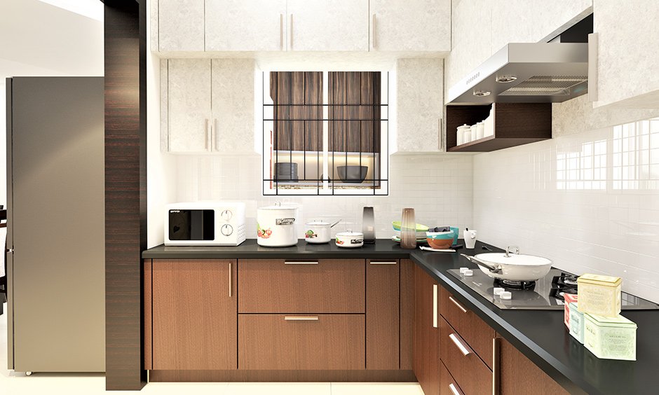 https://media.designcafe.com/wp-content/uploads/2022/12/02120101/Sunmica-design-for-kitchen-cabinets-in-wooden-brown-finish.jpg?utm_source=chatgpt.com