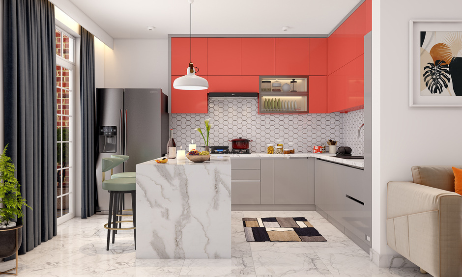 A kitchen with white marble and red cabinet