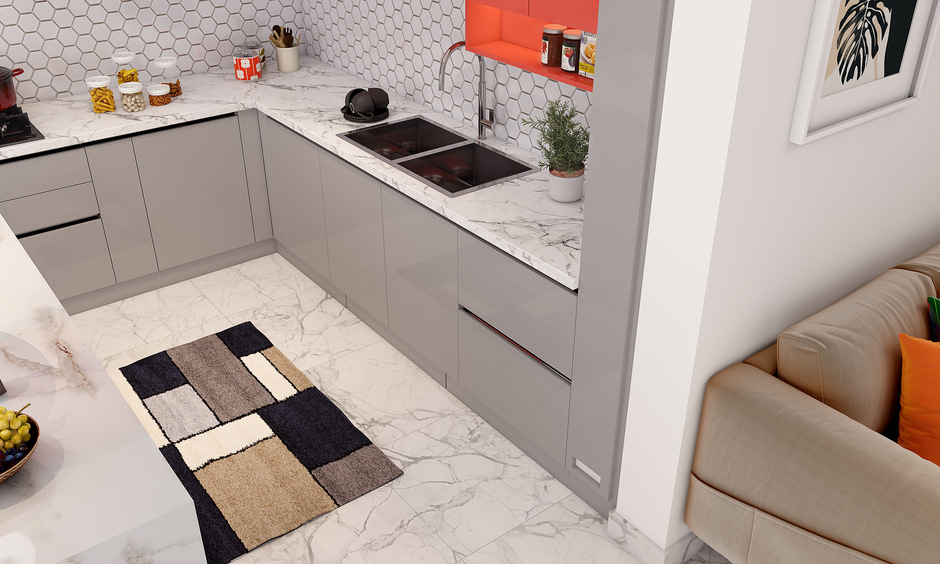 Marble island kitchen with closed cabinets