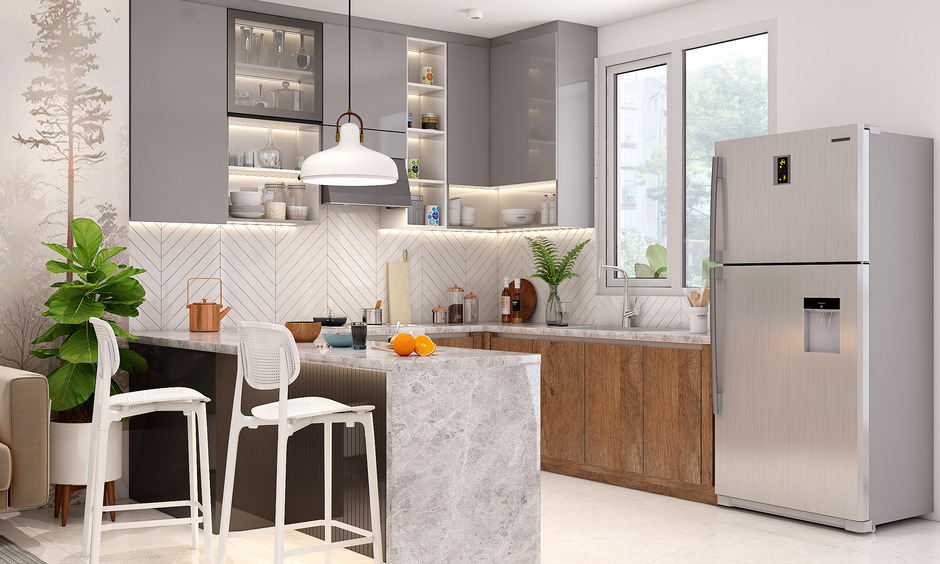 white and grey modular kitchen with attached dining table