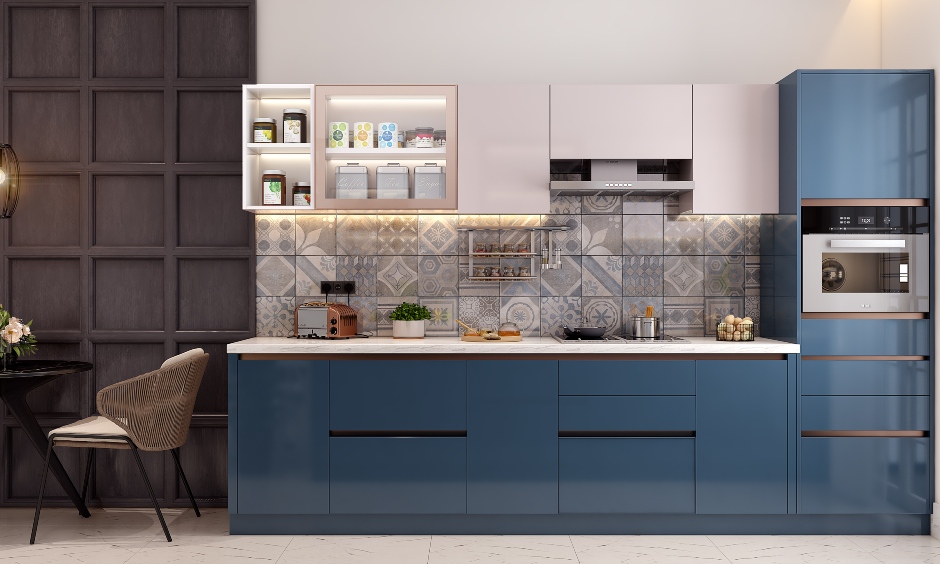 Blue parallel kitchen design features top and bottom handless cabinets