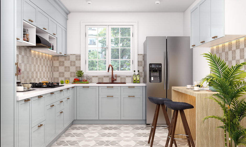 A small L-shaped kitchen with pastel colour cabinets for an airy vibe