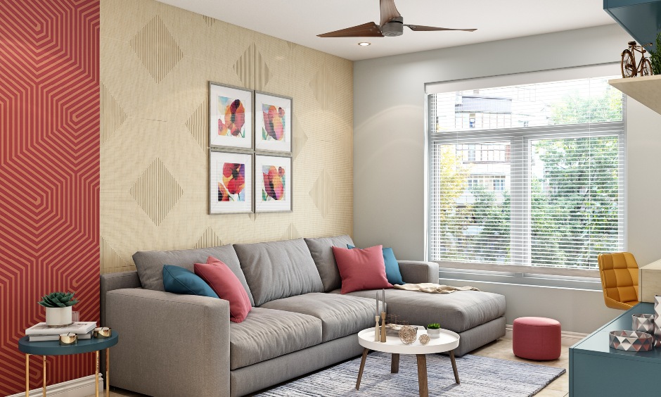 A vibrant living room design features grey l-shaped sofa