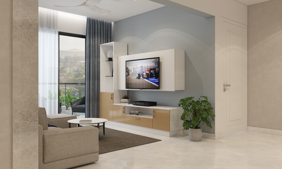 An open living space features white and beige tv unit