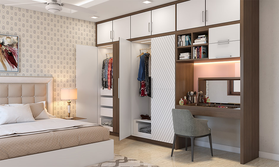 Veneer wardrobe with mirror and convertible dressing-study table 