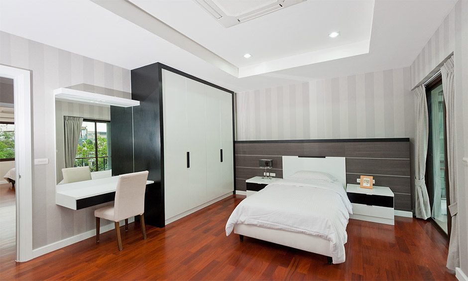 Floating dressing table beside wardrobe for modern space-saving interiors