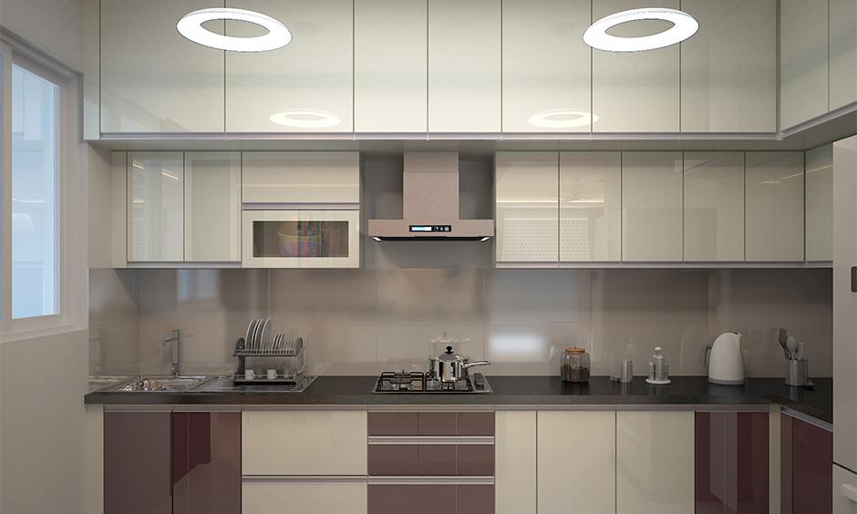 Minimalist modular kitchen with matte back-painted glass cabinets
