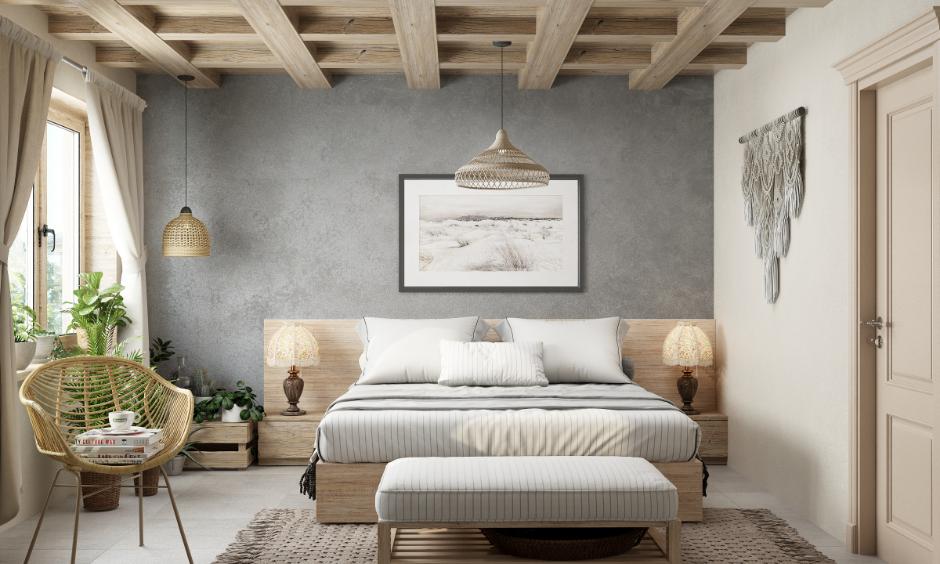 A relaxed living area with cottage home decor, featuring plush sofas, vintage chairs, and a rustic table.