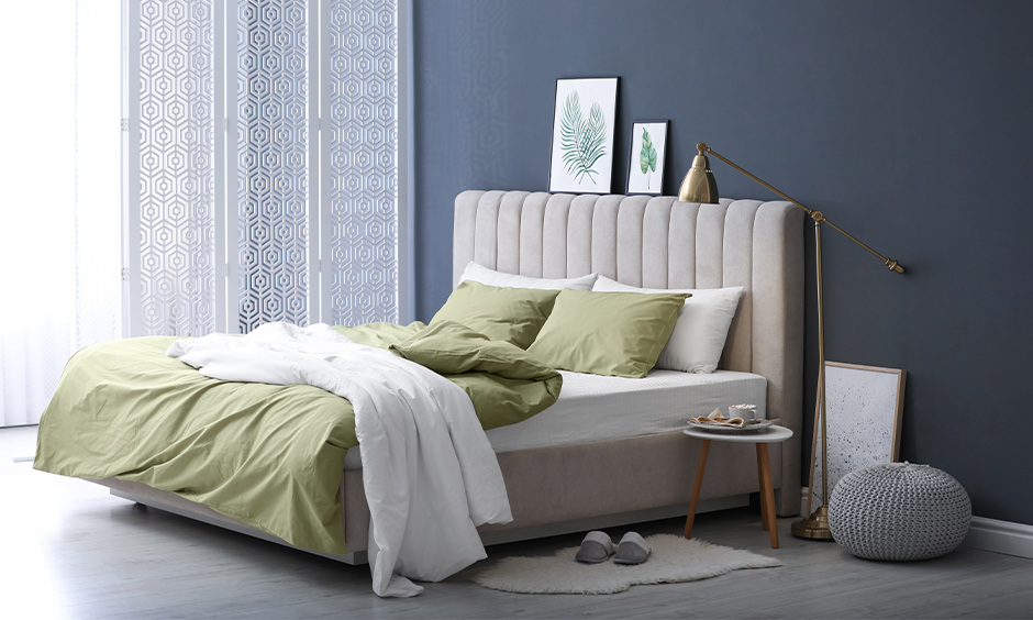 Pistachio green and grey bedroom colour combination creating a tranquil and tropical retreat.