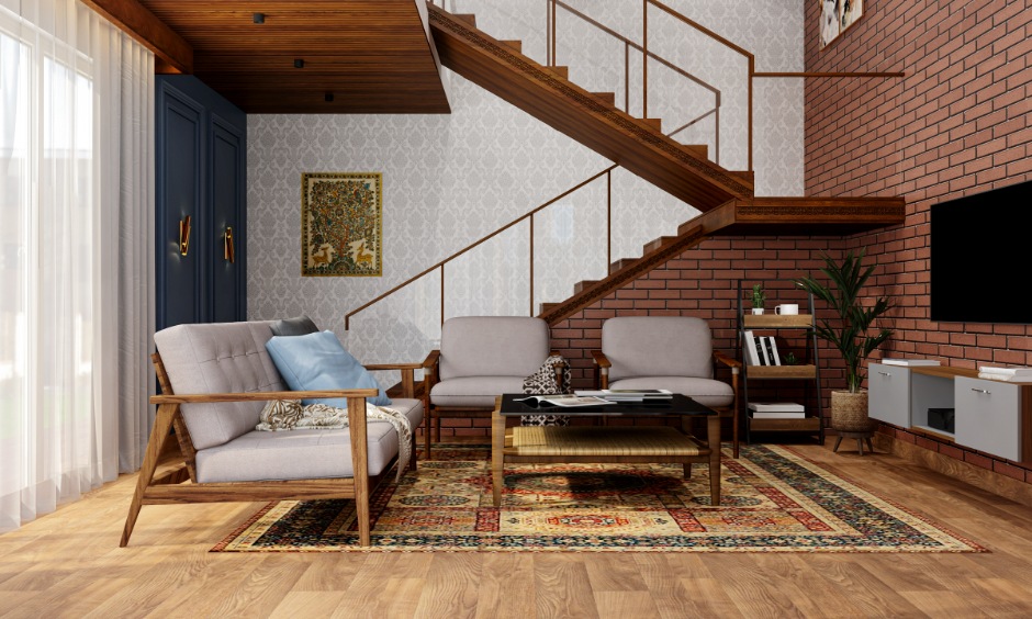 Wood and glass staircase with brick wall showing interior staircase design cost options for Indian homes