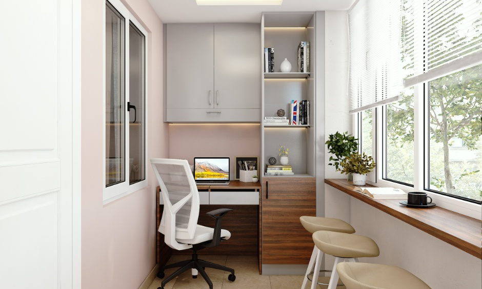 House balcony design used as a compact home office with window ledge seating and practical layout