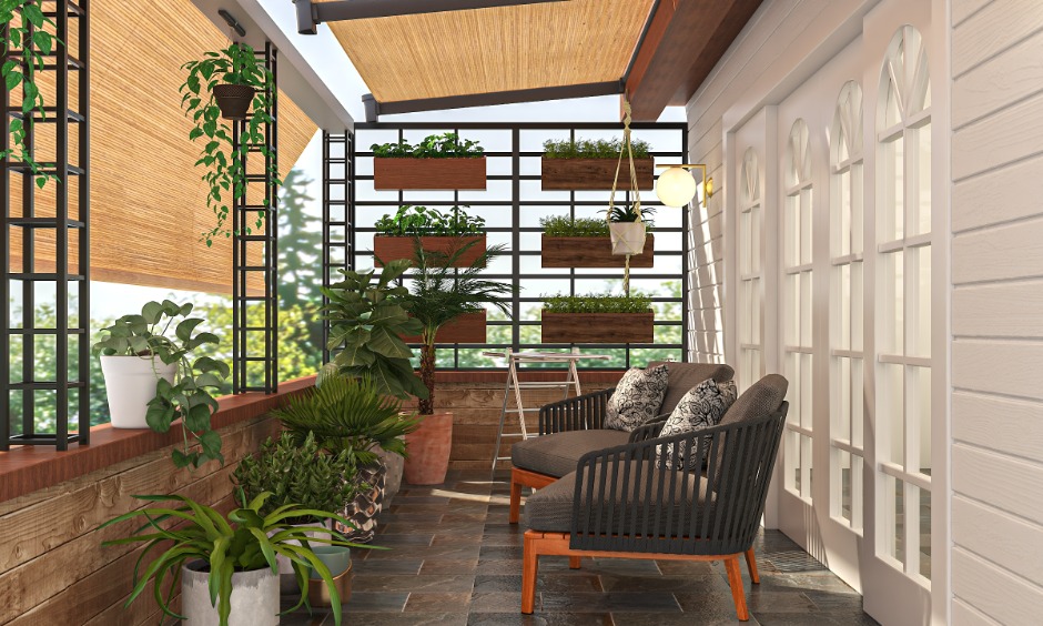 Budget balcony design with cosy seating, plants and bamboo blinds creating an affordable outdoor nook