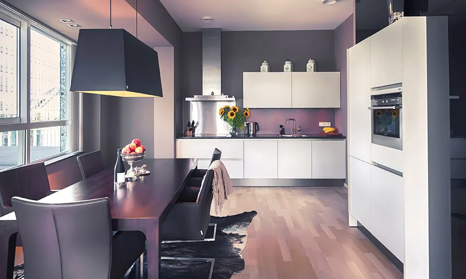 Fancy modular kitchen lighting with a bold ceiling fixture.