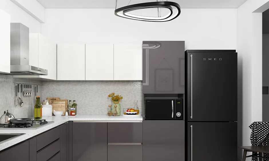Industrial kitchen lighting with a structured metal design in a black-and-white kitchen.