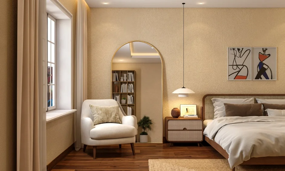 A finished 2BHK bedroom with a bed, bedside tables and built-in storage.