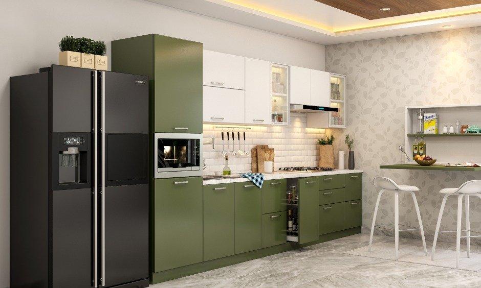 Modular kitchen design with corner storage and tall units for compact Gurgaon home