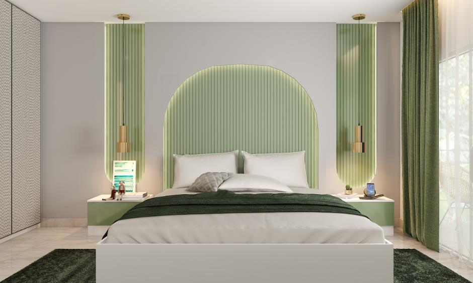 Green bedroom interior with eucalyptus walls, moss-green linens, soft lighting, and forest wallpaper.