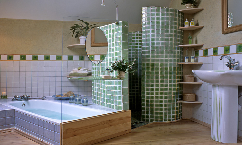 Practical green interior design with mirrors and lighter hues for bright rooms.