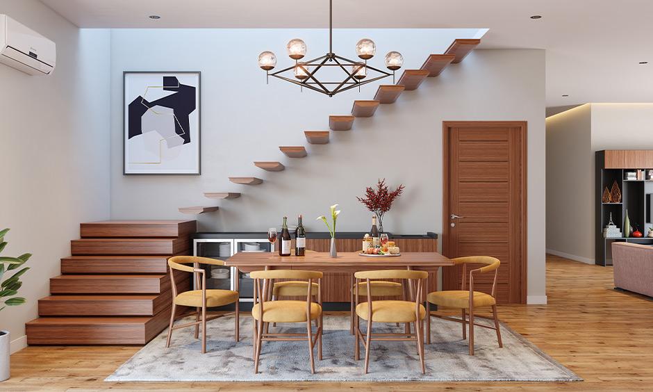 A minimal dining room featuring beige-painted walls and elegant decor.