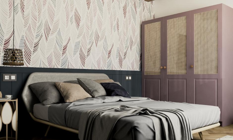 Bedroom with soothing paint colours, grey bedding and dusty mauve wardrobe