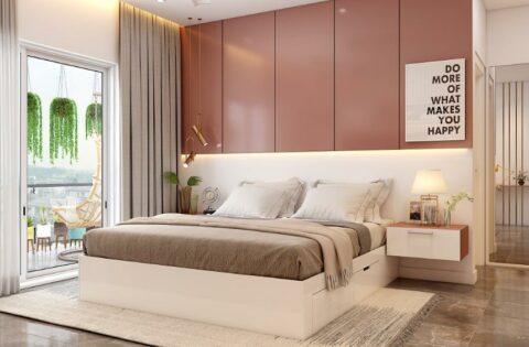 Bedroom with dusty pink cabinets, neutral bedding and soft lighting in a soft colour palette