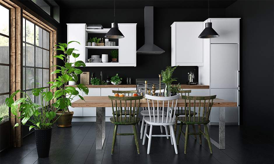Urban rustic kitchen with raw wood cabinets, steel shelves, and exposed bulbs.