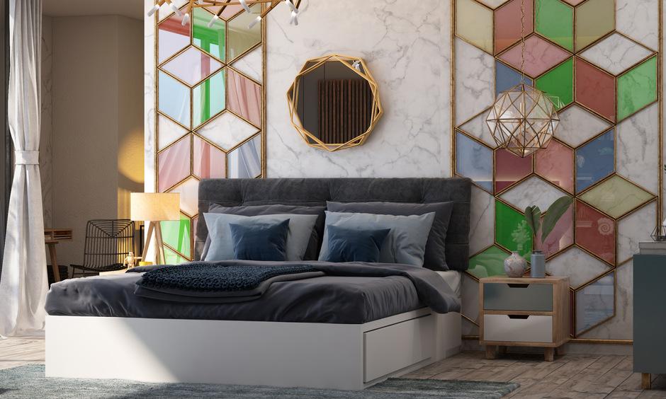 Modern geometric interior design incorporates angular furniture, rugs, and patterned walls for style.