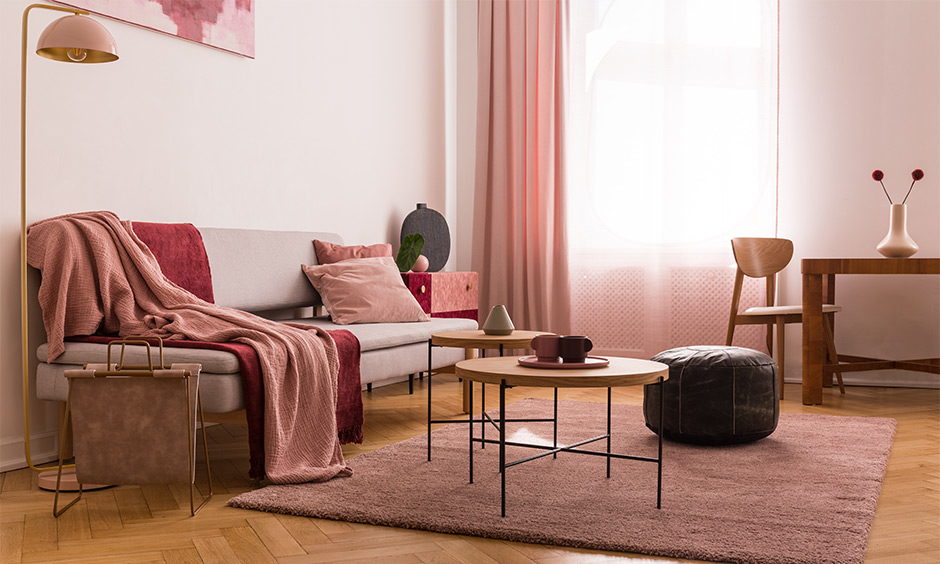 Wood coffee table with a low stack of books to add a relaxed fit