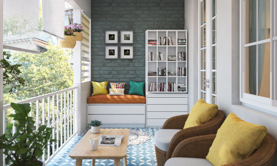 Modern balcony with iron railing, bookshelf and seating for a cosy corner