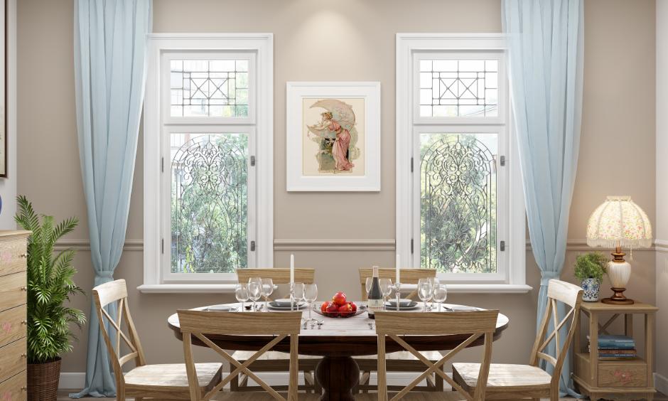 Dark iron grill with white window frame showing a high-contrast window grill colour paint.