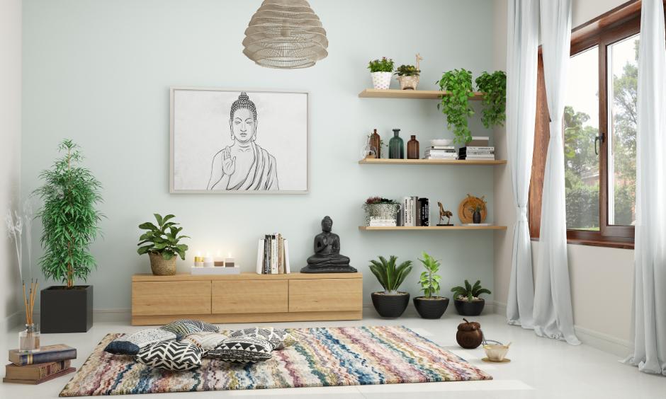 Serene corner with a Buddha statue and soft lighting for peaceful home vibe