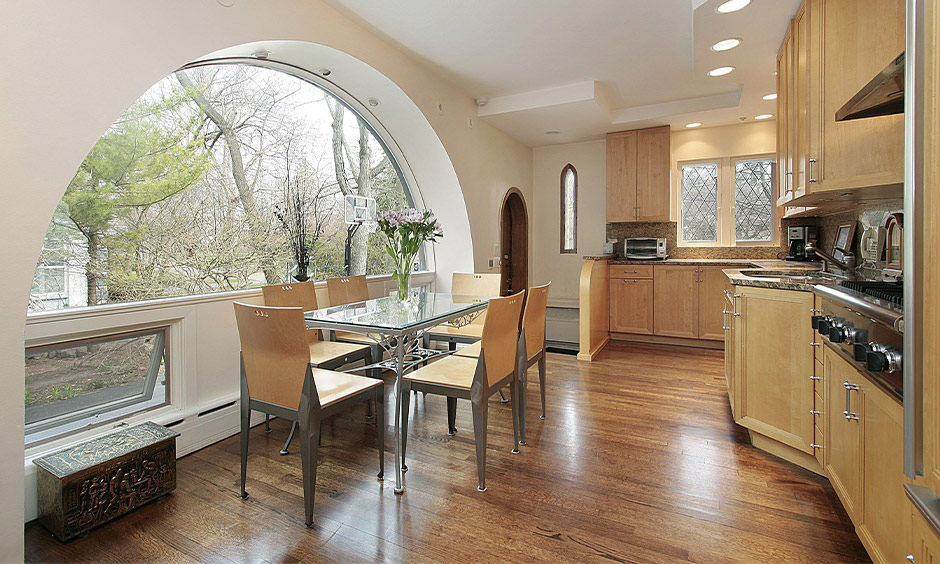 L-shaped kitchen interior with stylish window design