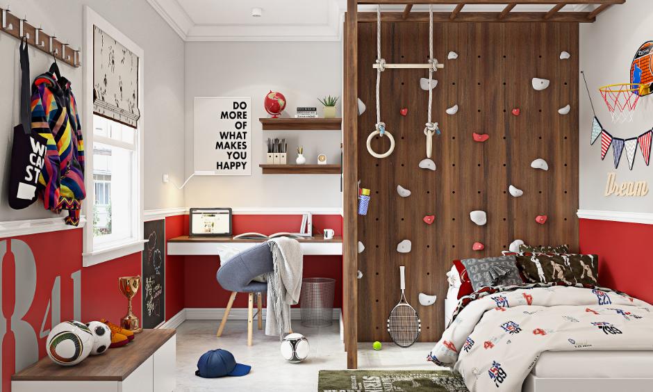 Outer space cool kids bedroom theme with rocket-shaped desk and starry wall decals