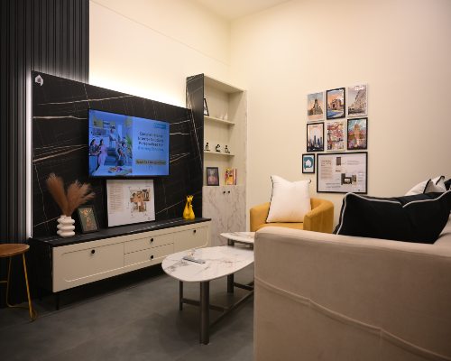 Living Room with floating tv unit in l-shape at ahmedabad designcafe studio