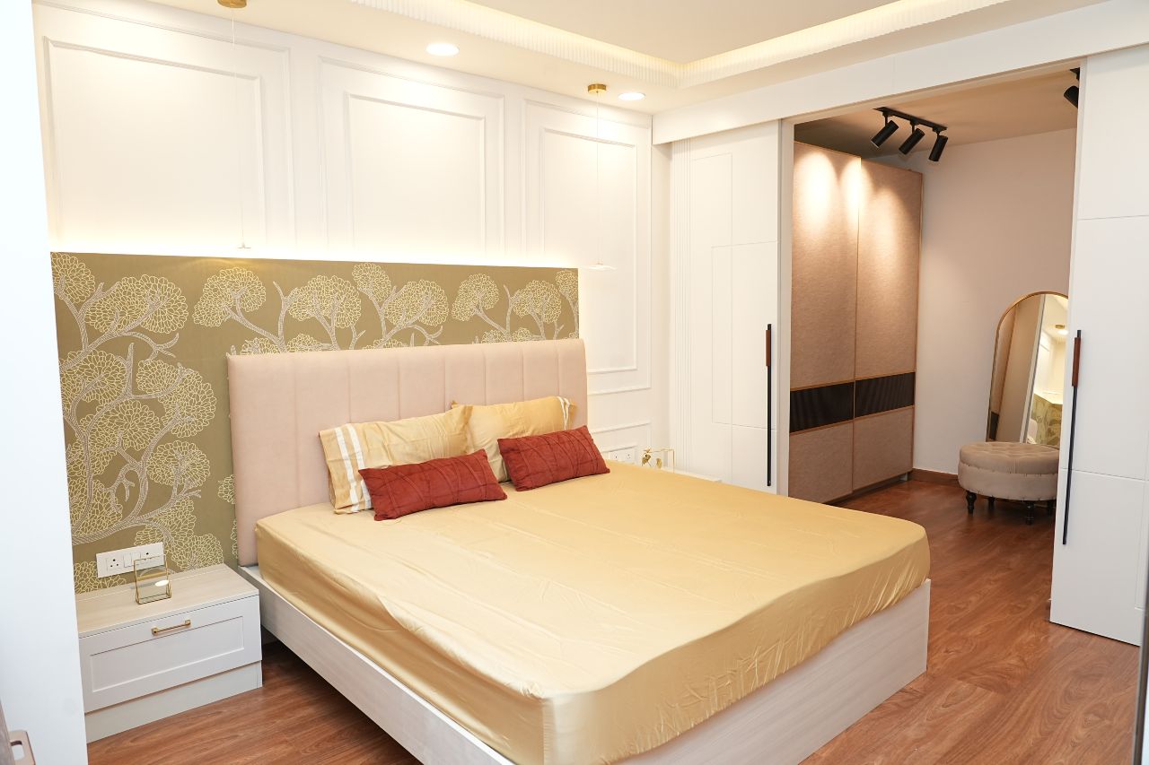 Elegant modern bedroom model showcased at DesignCafe Experience Centre in Hebbal, featuring stylish decor.